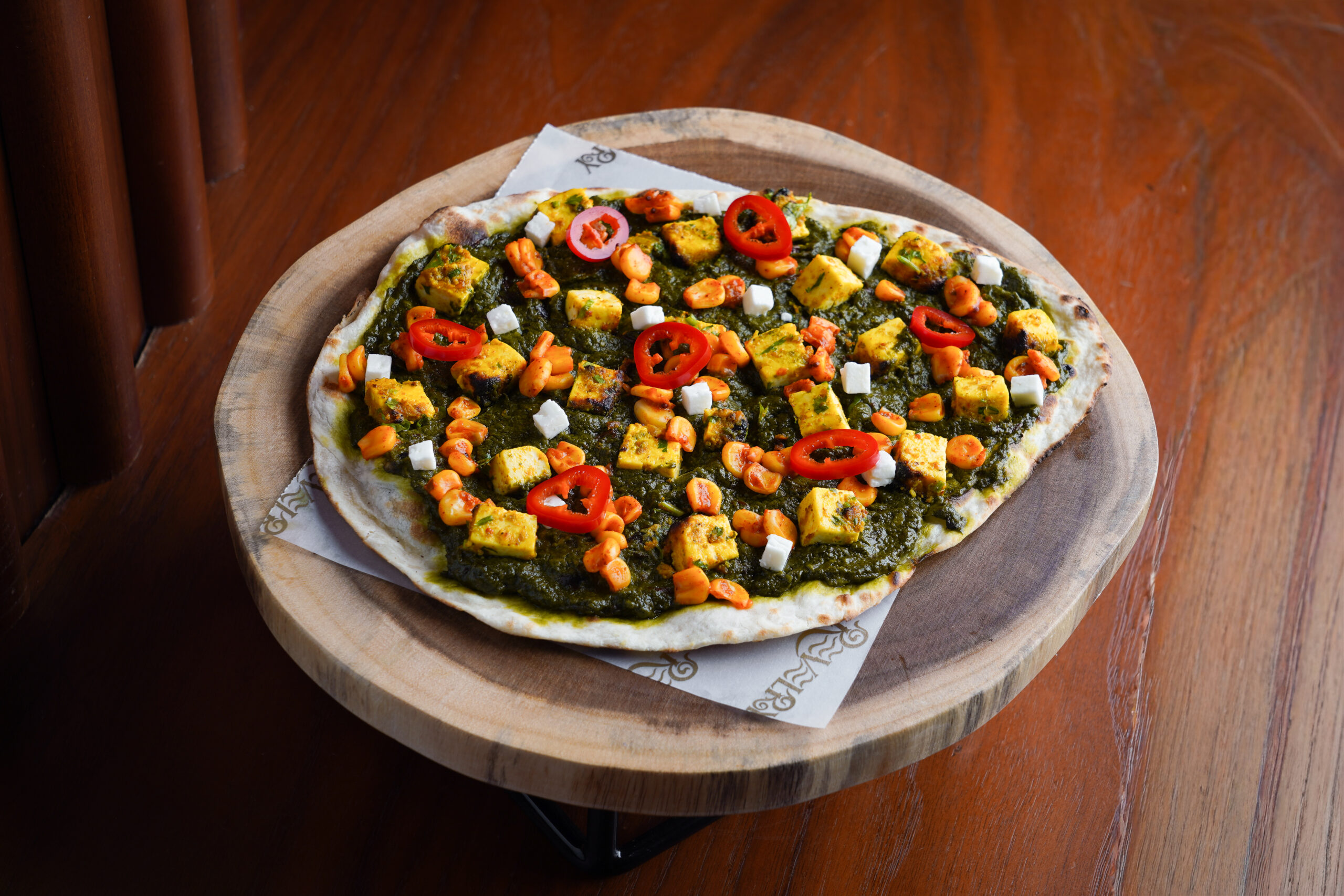 Naan-izza – Lasooni Saag Paneer & feta, Pickled Jalapeno