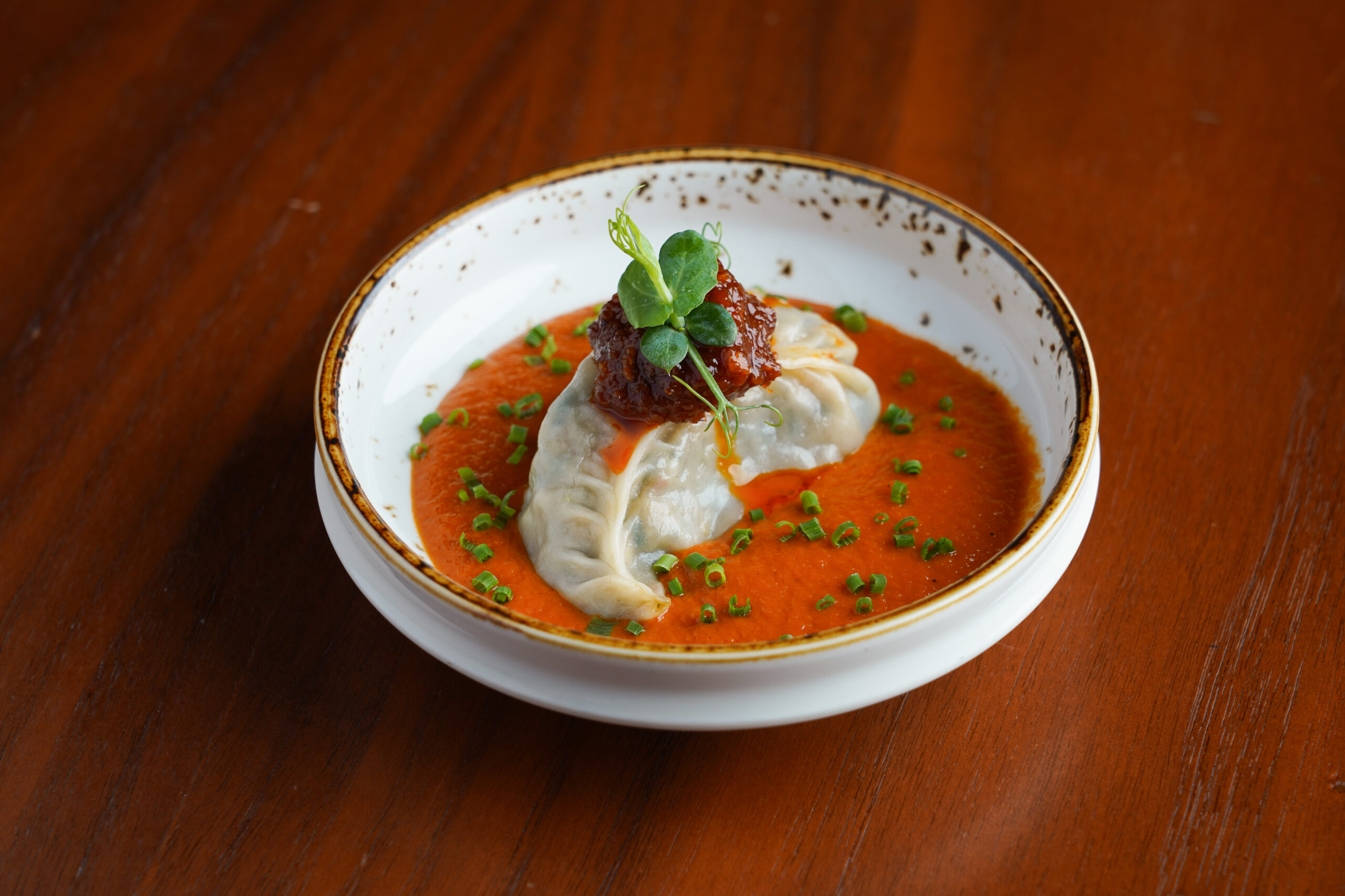 Soy Glazed Vegetable Dimsum, Smoked Tomato Relish, Schezwan Chutney